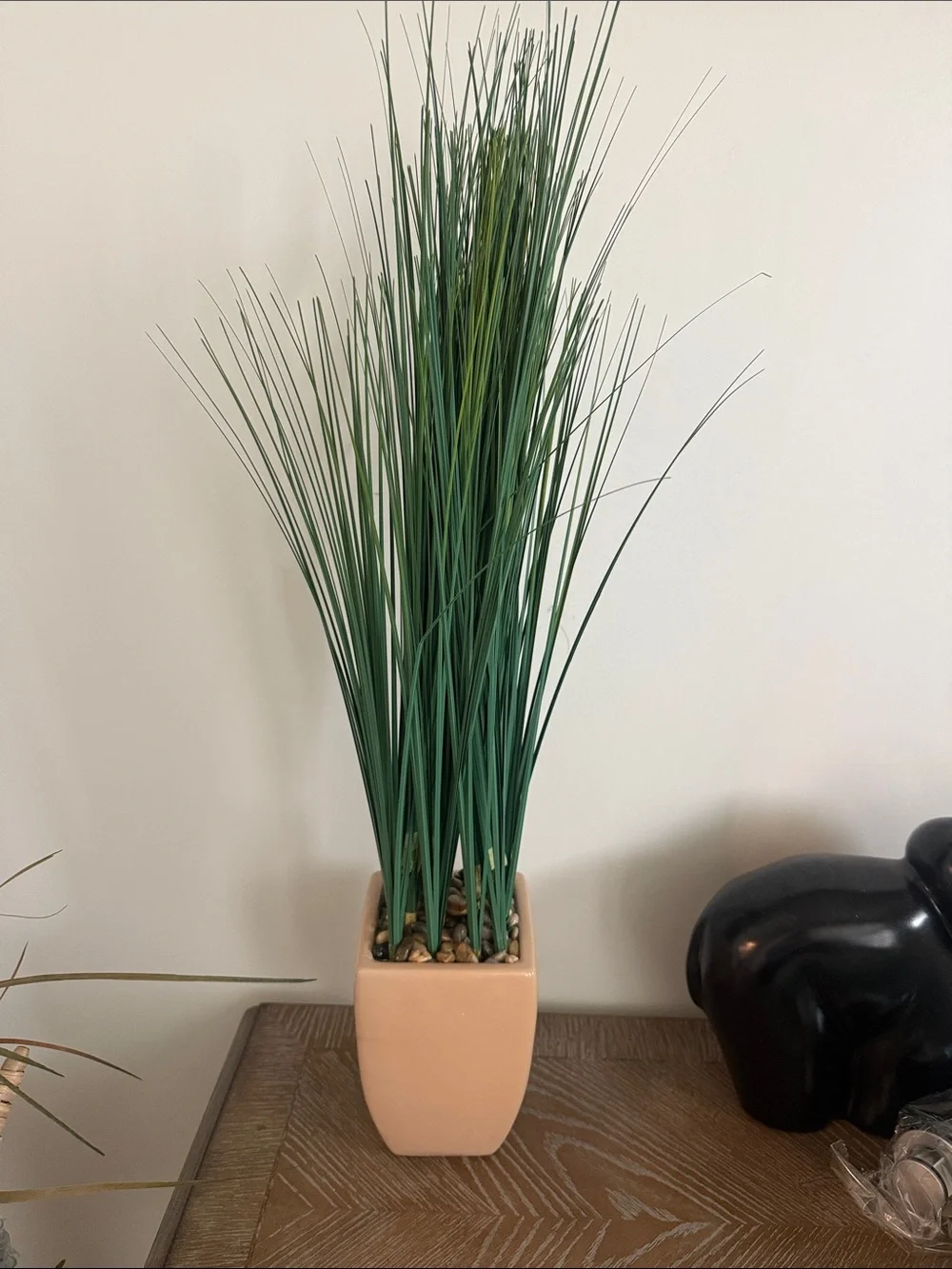 Lifelike artificial grass plant